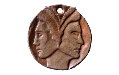 carved leather amulet janus head