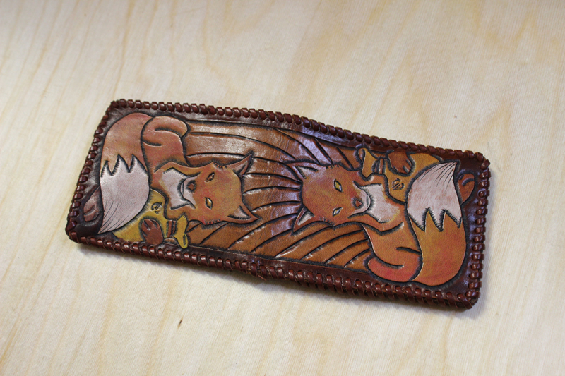 money purse with leather carving fox